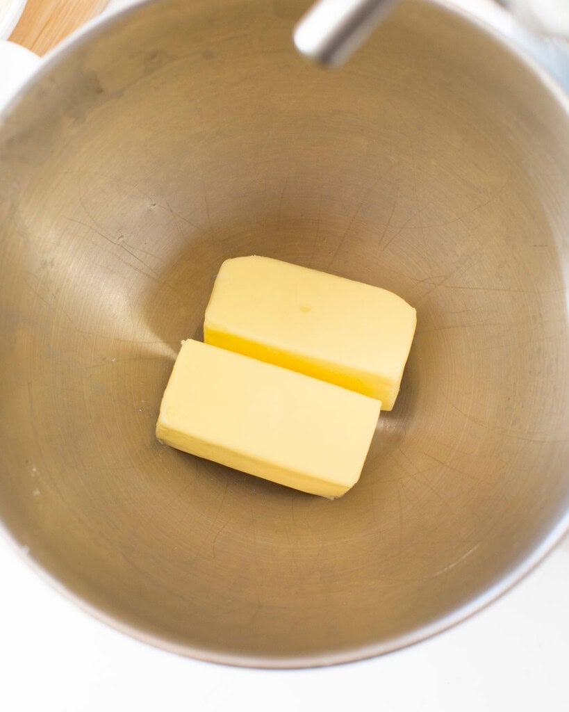 Butter in a stand mixer bowl.