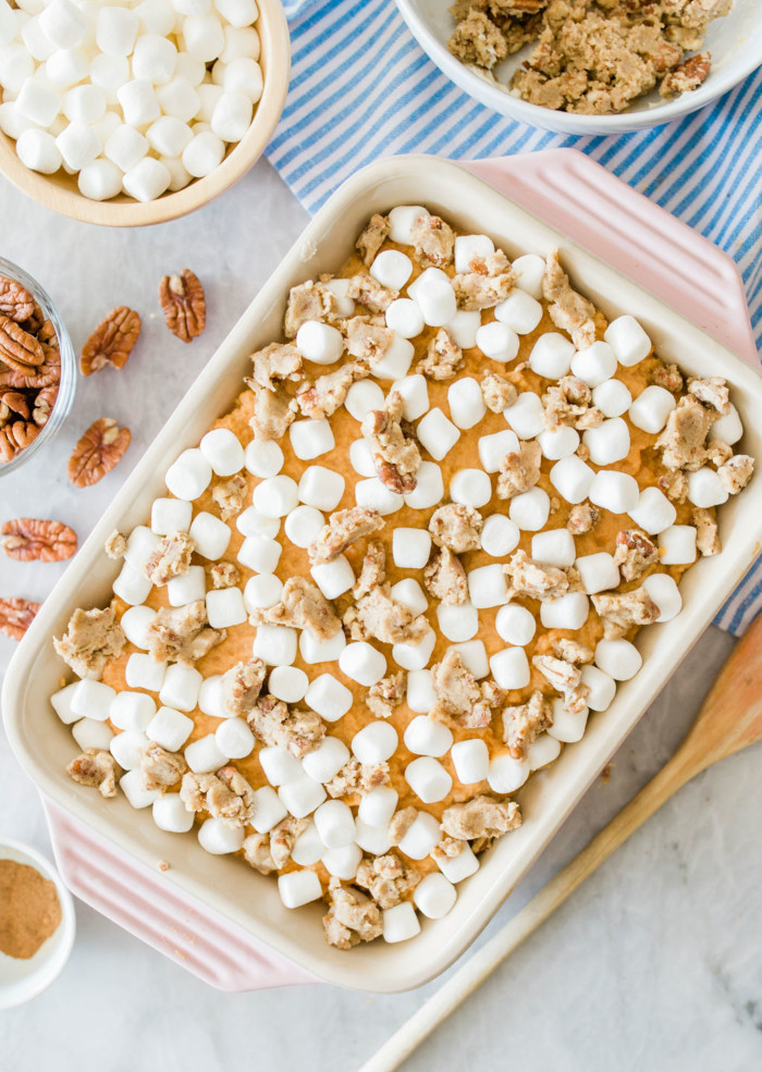 Sweet potato casserole topped with marshmallows.