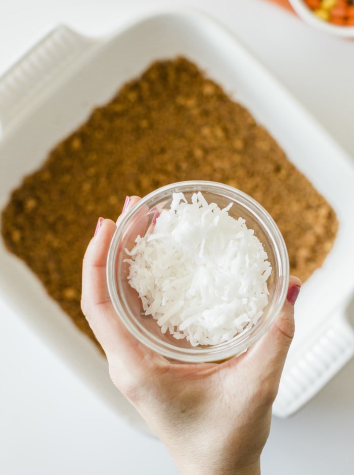 coconut in a small bowl for pumpkin bars.