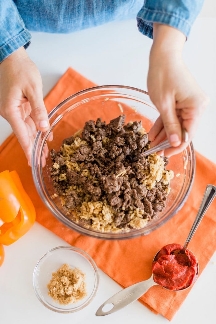ground beef and rice in a bowl for stuffed bell peppers.