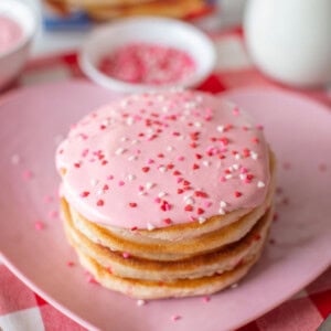 stack of valentine's pancakes on a pink plate