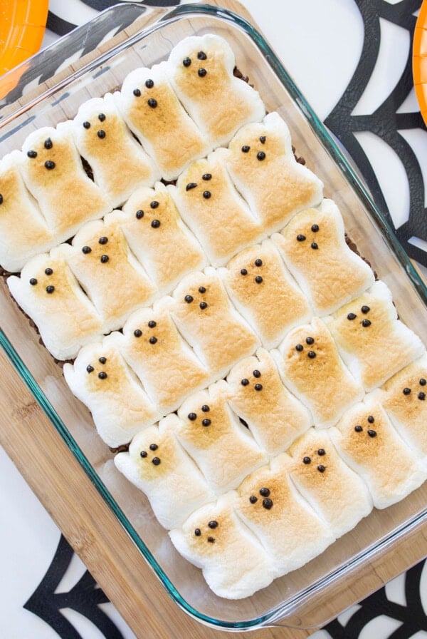 Halloween s'mores dip. Browned Peeps marshmallow ghosts over melted chocolate chips.
