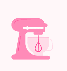 Pink stand mixer with a mixing bowl and flat beater attachment, set against a light background.